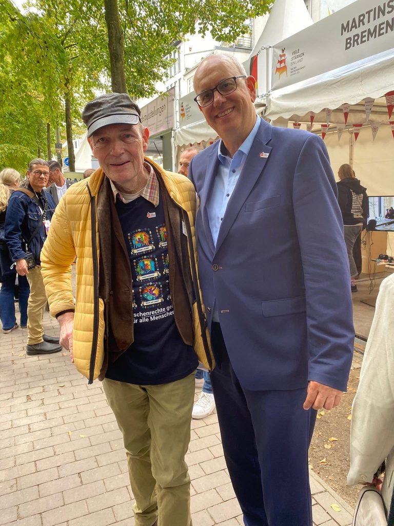 Begegnung auf dem Bürgerfest zum Tag der Deutschen Einheit: Bremens Bürgermeister Dr. Andreas Bovenschulte und Gerald Wagner von der LAG Selbsthilfe